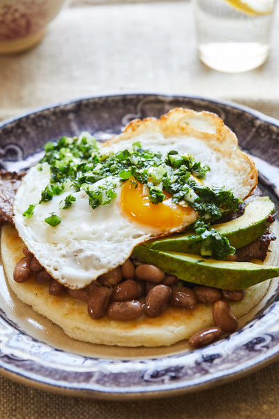 Arepas with Fried Eggs, Cowboy Beans and Salsa Aji